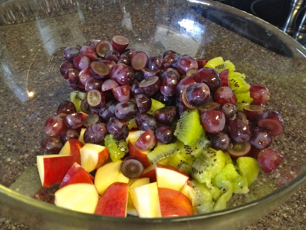 Mint Berry Fruit Salad adding fruit