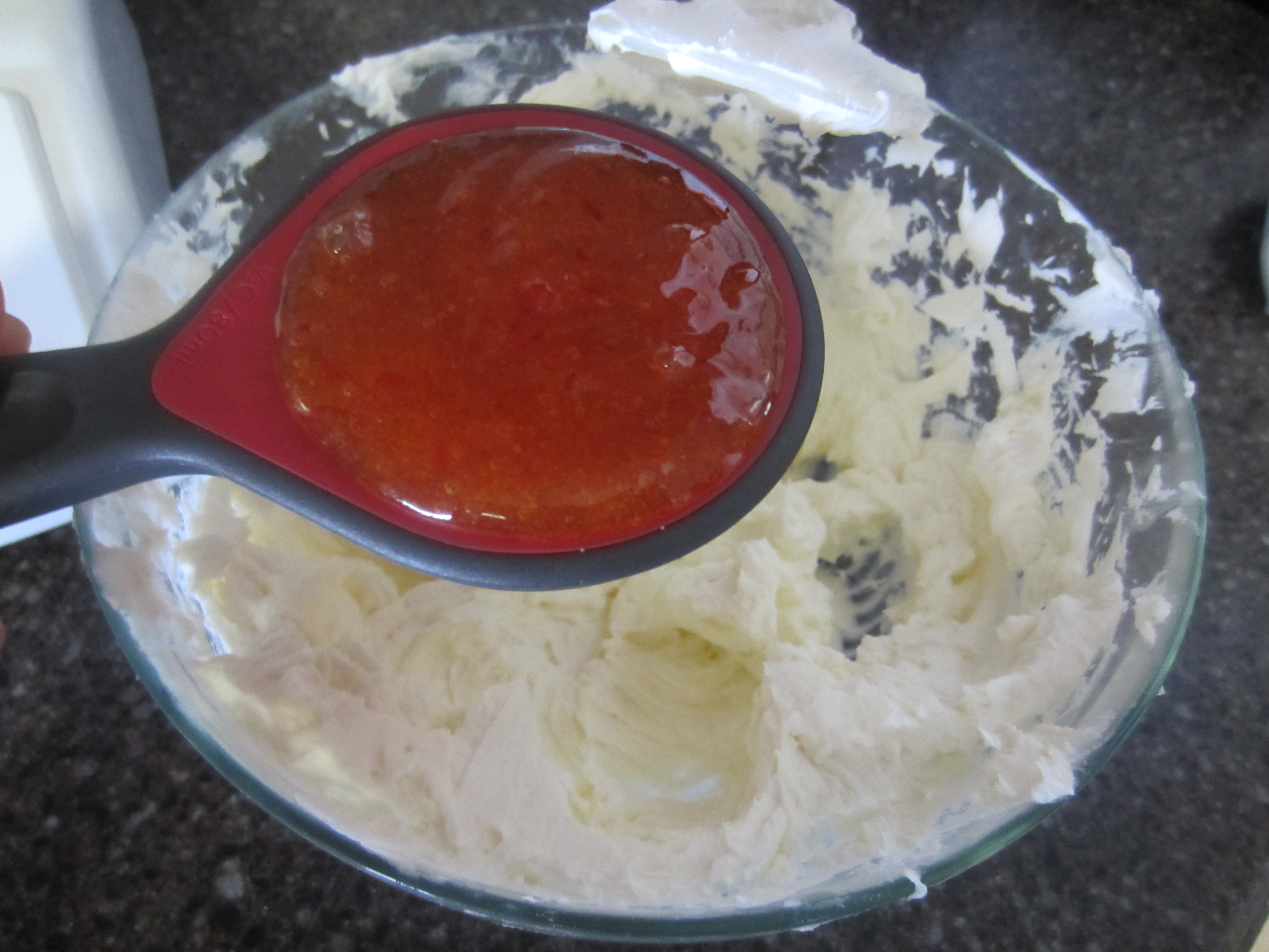 Adding Red Pepper Jelly to dip