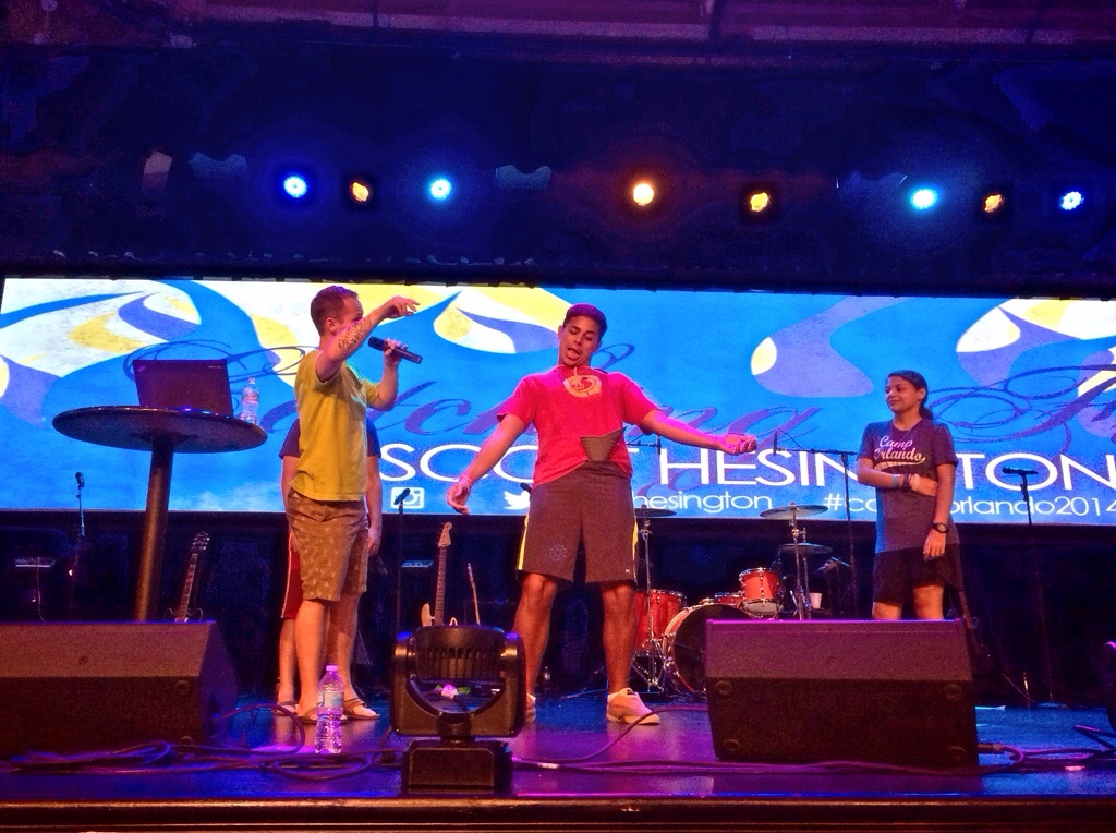 Scott playing games on stage