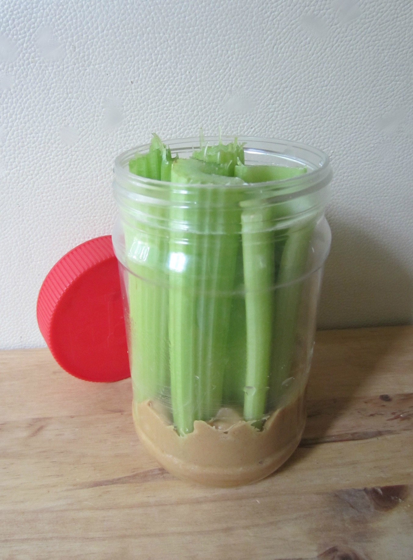 celery sticks in peanut butter snack