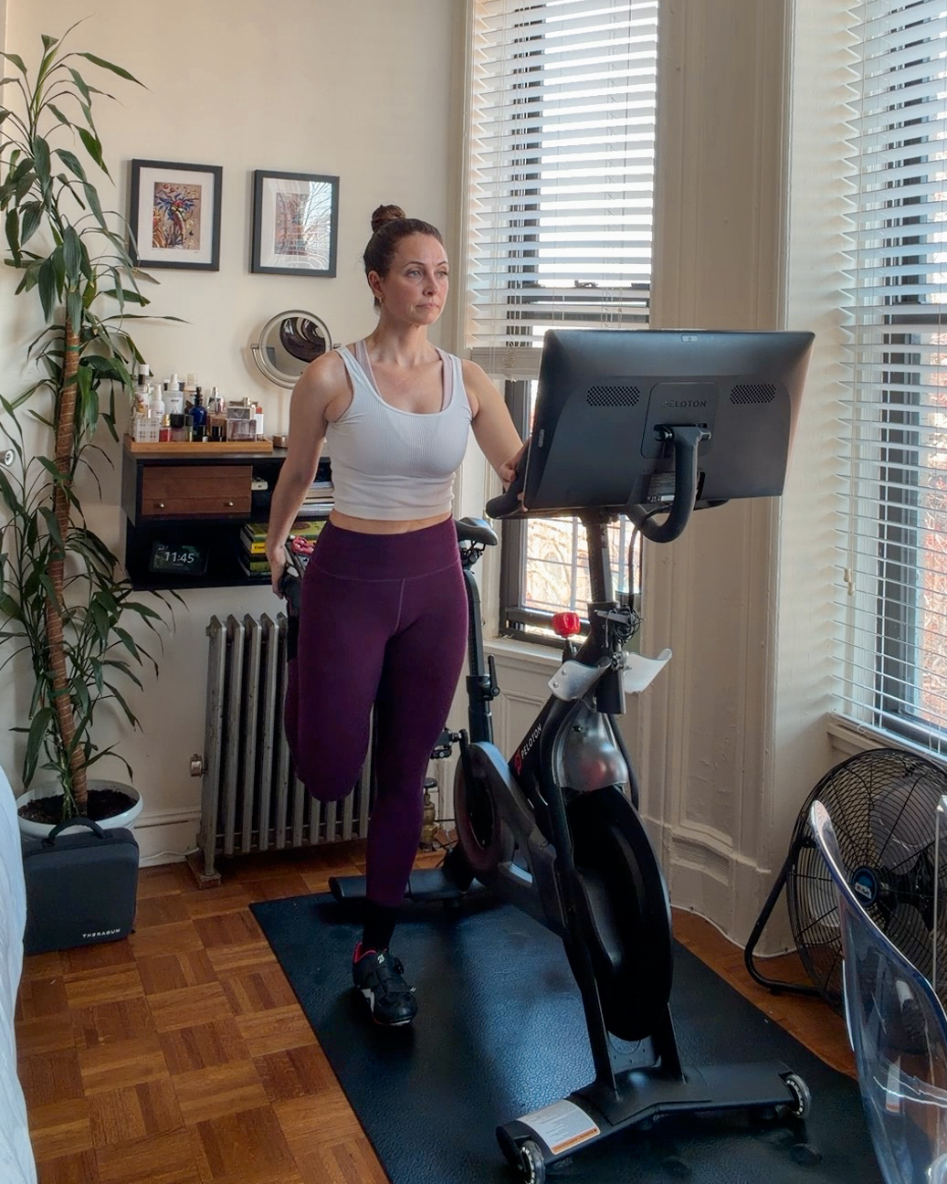 Heather Peloton stretching at home